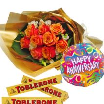 Send 12 Yellow Rose With Toblerone and Balloon to Dhaka in Bangladesh